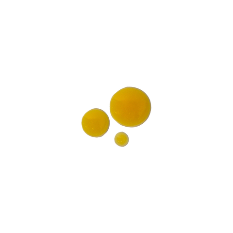 Golden gel-like serum texture swatched on a smooth surface