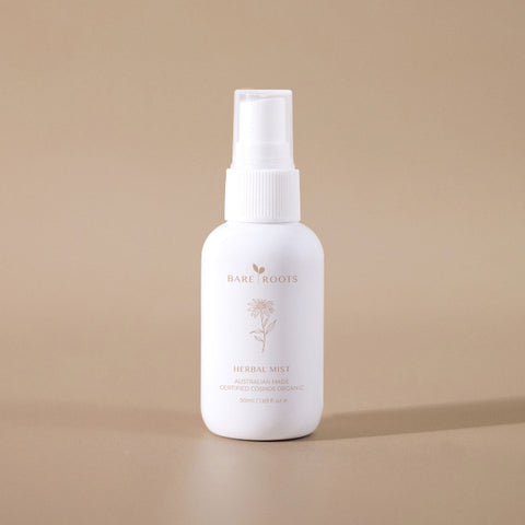Herbal Mist bottle upright on a beige background for a clean, natural look