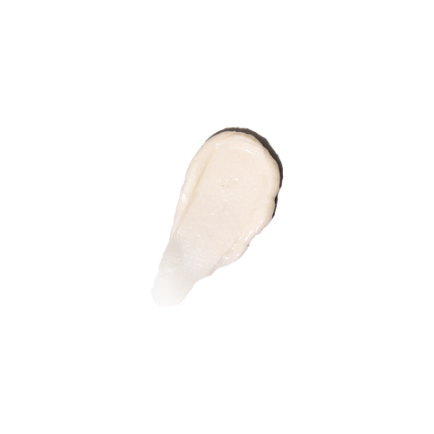 Close-up of Gentle Cleansing Milk creamy texture swatch.