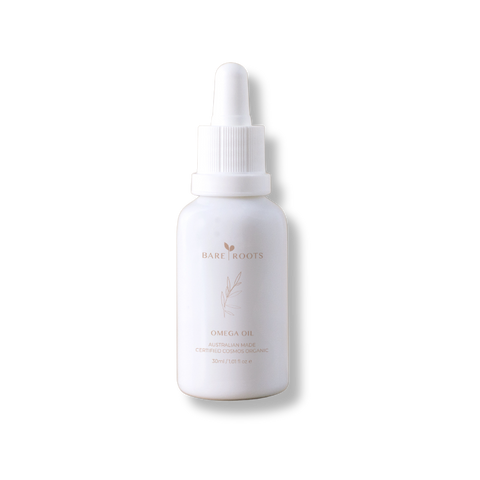 White bottle with a dropper labeled 'Bare Roots' on a white background