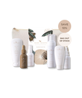 Bare Roots Balancing Collection skincare gift set featuring multiple white bottles and tubes, a brown dropper bottle, a canvas pouch, and promotional badges on a white background.