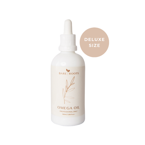 Bottle of Bare Roots Omega Oil with 'Deluxe Size' label on a white background