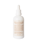 White bottle with dropper on a white background