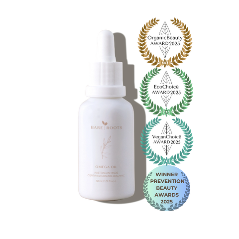 White bottle with dropper labeled 'bare roots' on a white background with multiple award logos.