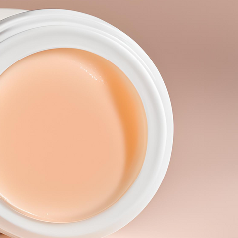 Close-up of Bare Lips lip balm showing smooth creamy texture inside the jar.