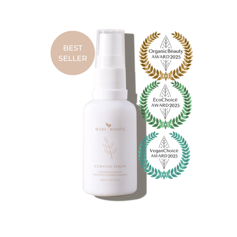 White serum bottle with awards on a white background
