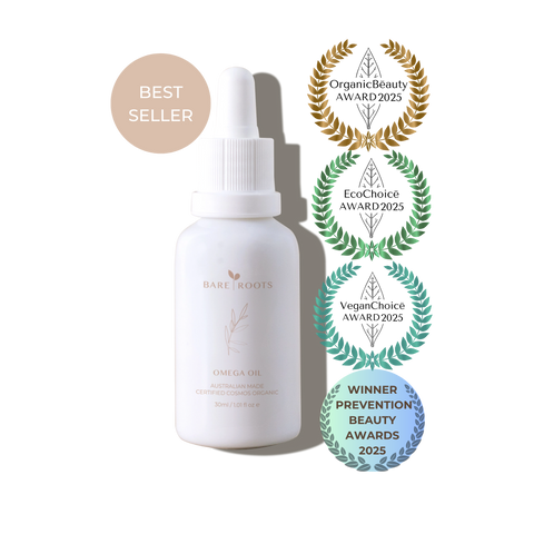 White bottle with dropper labeled 'bare roots' on a white background with multiple award logos.