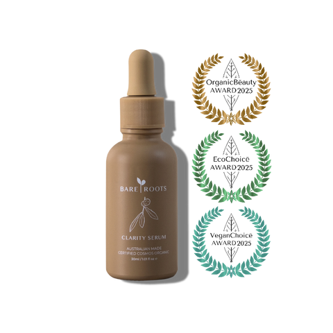 Brown serum bottle with dropper labeled 'Bare Roots' on a white background with award logos.