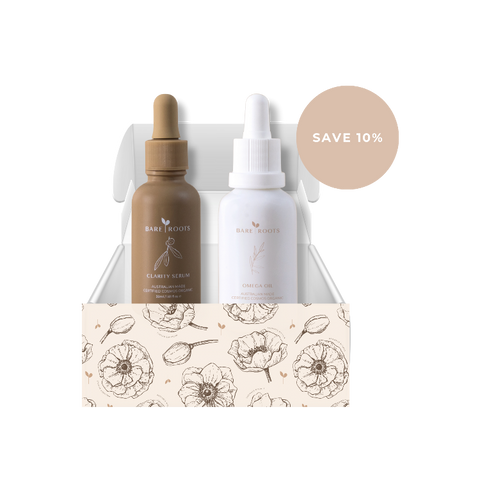 2 product bottles in box against plain background