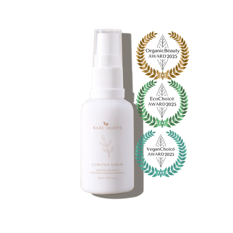 White serum bottle with awards on a white background