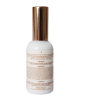 Skincare bottle with copper cap on a white background