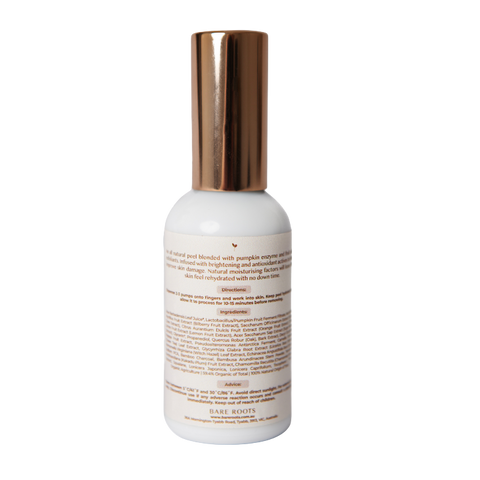 Skincare bottle with copper cap on a white background